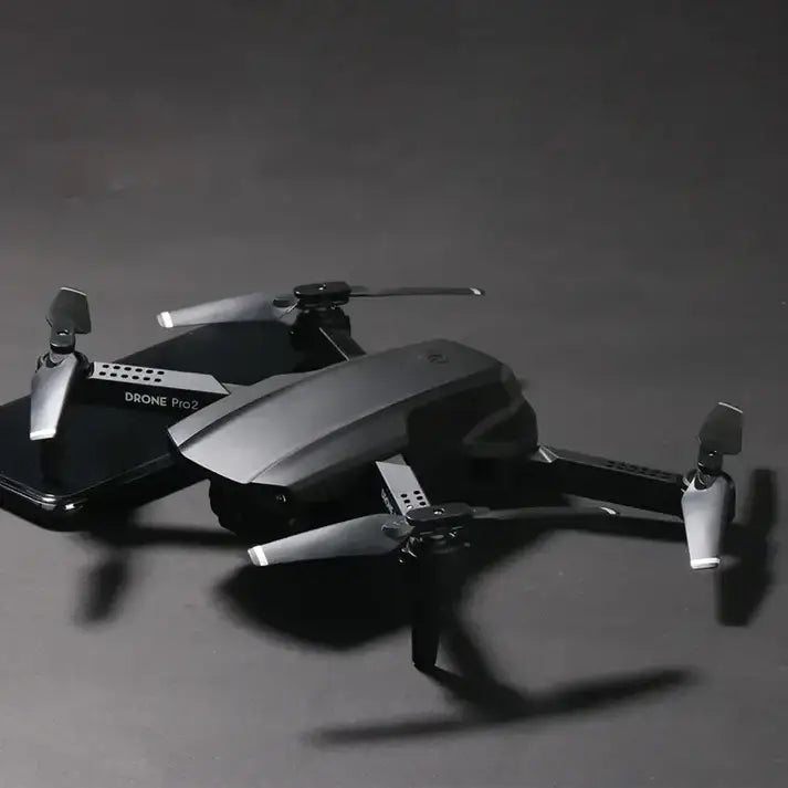 E99 Pro2 drone with LED night lights flying confidently after dark.