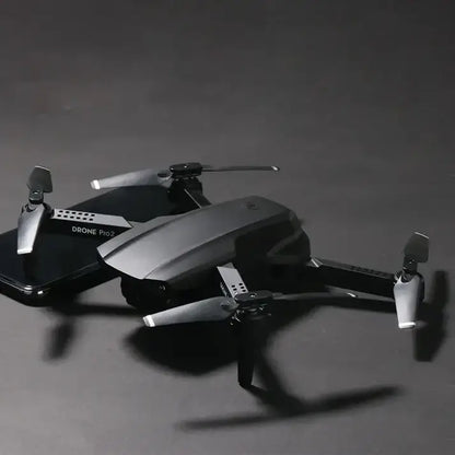 E99 Pro2 drone with LED night lights flying confidently after dark.